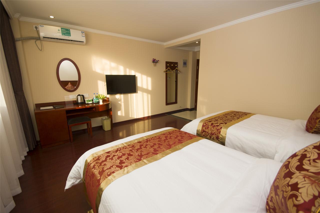 Greentree Inn Jiangsu Taizhou Taixing East Guoqing Road Rt-Mart Business Hotel Esterno foto